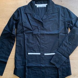 Victorialand long sleeve cotton blouse.